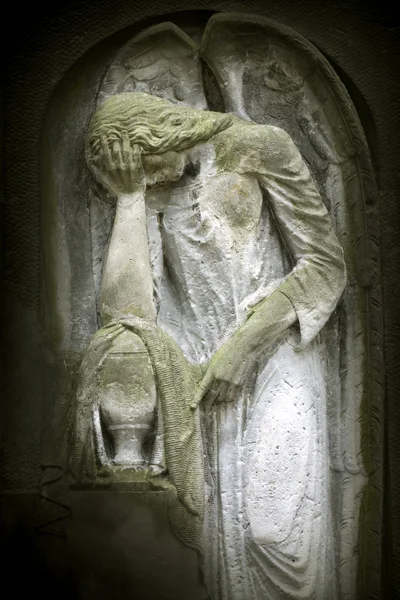 Angel on tombstone on old cemetery — Stock Photo, Image