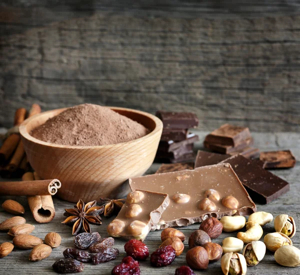 Chocolate nuts cocoa and ingredients — Stock Photo, Image