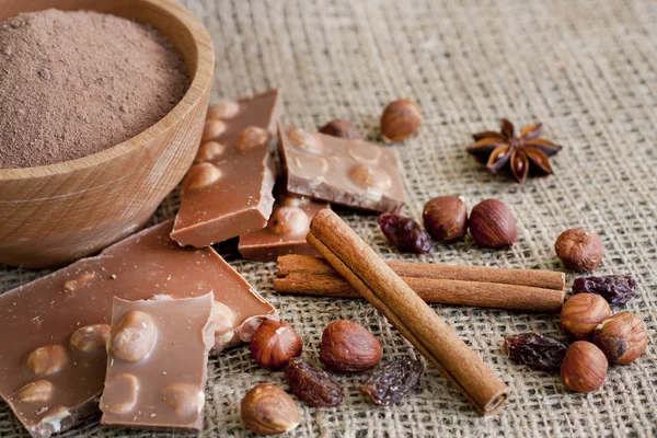 Chocolate nuts cocoa and ingredients — Stock Photo, Image