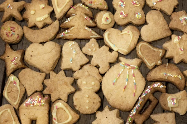 Weihnachten hausgemachte Plätzchen auf Holzbrettern Hintergrund — Stockfoto