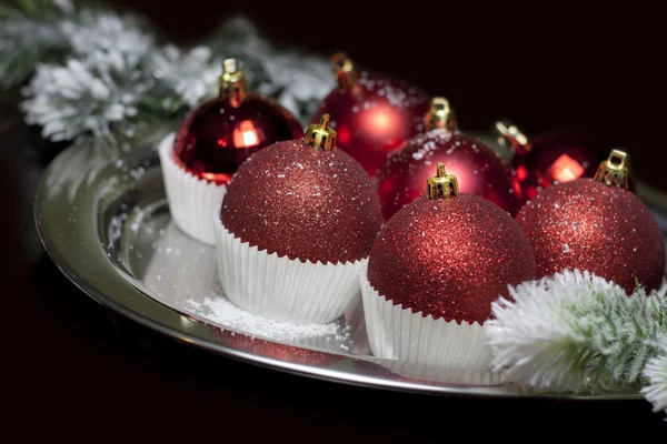 Christmas baubles in cup cupcakes food concept — Stock Photo, Image