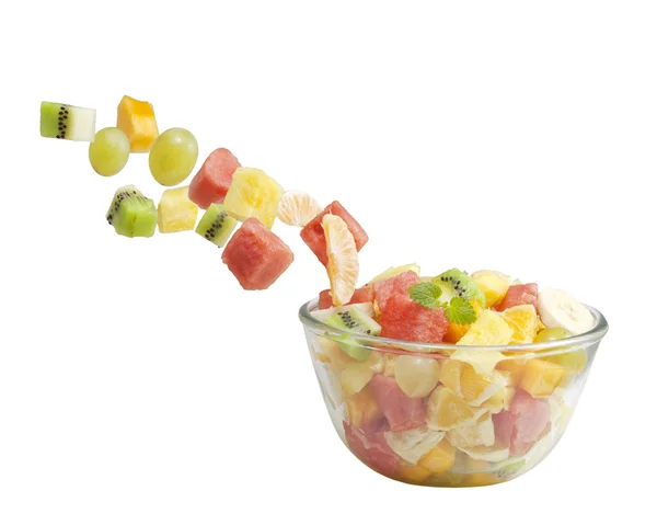 Salade de fruits mouches dans le bol isolé sur fond blanc — Photo