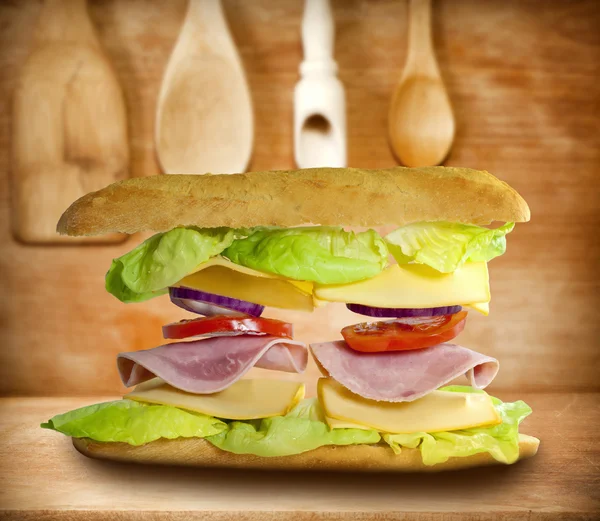 Sandwich on old vintage wooden boards abstract concept — Stock Photo, Image