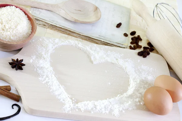 Heart of the flour baking background concept with recipe — Stock Photo, Image