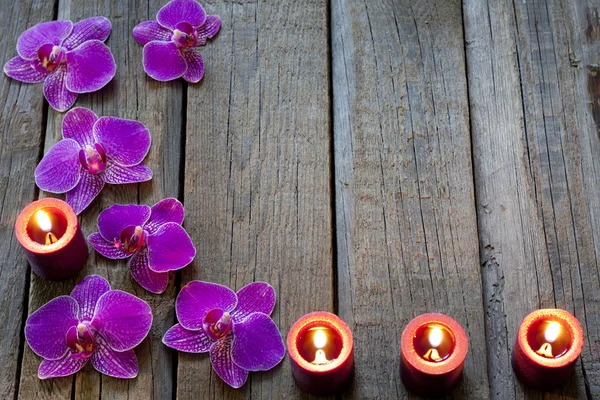 Orchidea e candele spa cosmetico astratto sfondo vintage — Foto Stock