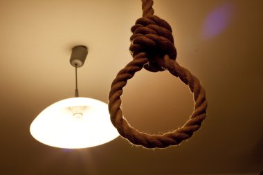Suicide, hanged in the room concept