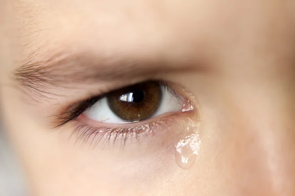 Crying little girl with tear closeup — Stock Photo, Image