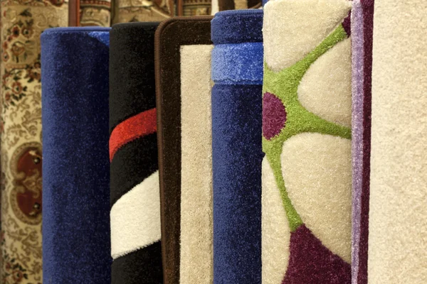 Colorful carpets in the store — Stock Photo, Image