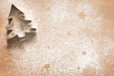 Noel yemeği arka plan kurabiye kalıpları ve un ile