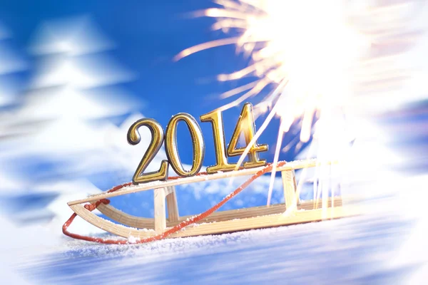 2014 new year numbers on sled abstract on snow background — Stock Photo, Image