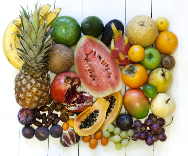 Exotic fruits variety still life on vintage wooden boards — Stock Photo, Image