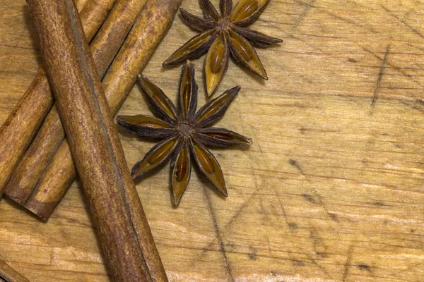 Anise star on wooden board background closeup concept — Stock Photo, Image