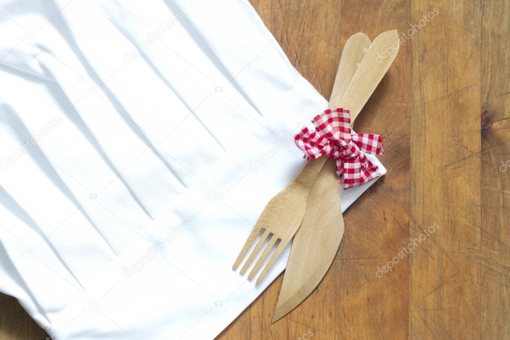 Chef hat and empty cutting board abstract food background