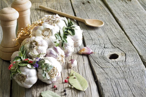Organic garlic in the kitchen on the wooden table still life