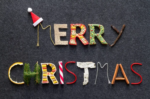 Feliz Natal Lettering Feito Vários Produtos Natal Fundo Escuro — Fotografia de Stock