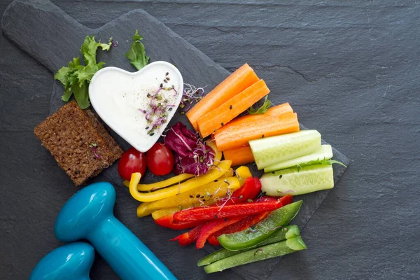 Assorted Fresh Chopped Vegetables Dip Dumbbells Dark Background Sport Healthy — Stock Photo, Image