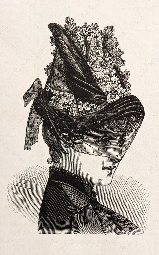 Young woman wearing an elegant hat