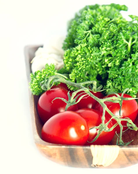 Red tomato with parsley — Stock Photo, Image