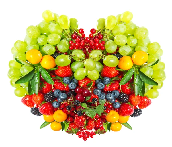 Heart shape of mixed berries and fruits — Stock Photo, Image