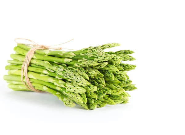 Sheaf of asparagus on white background — Stock Photo, Image