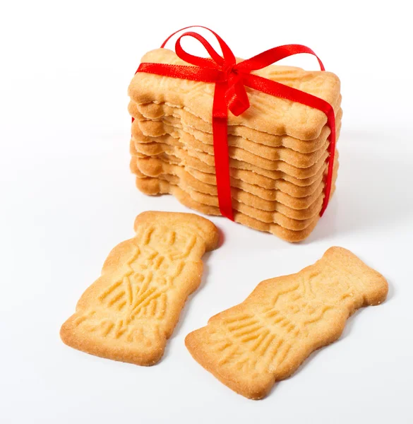 Biscoitos de Natal com fita vermelha — Fotografia de Stock