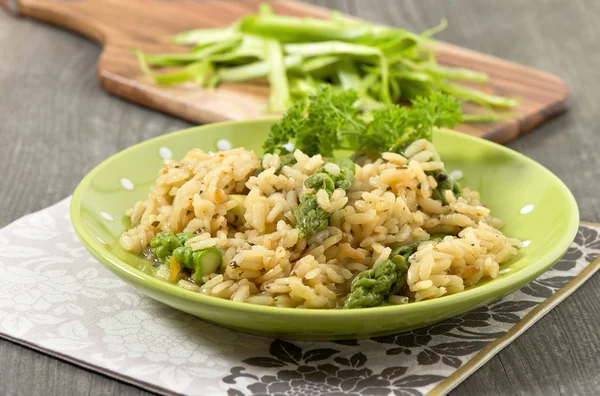 Closeup of risotto with green asparagus — Stock Photo, Image