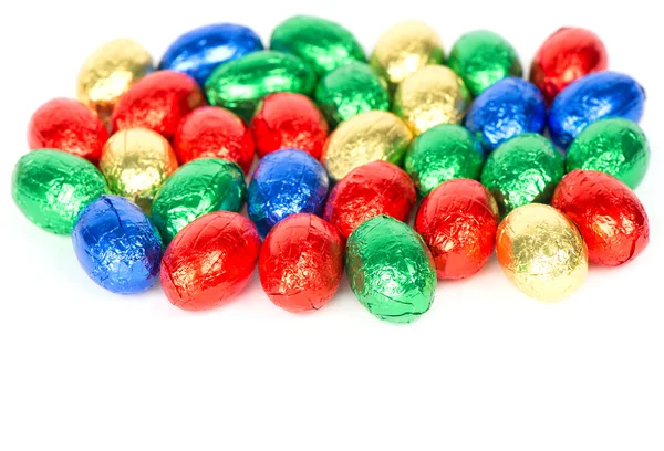 Chocolate easter eggs in colorful foil — Stock Photo, Image