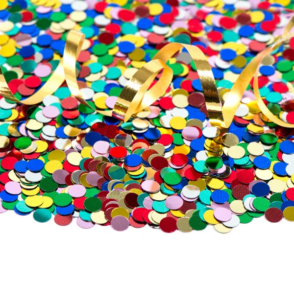 Colorful confetti background with golden streamer — Stock Photo, Image