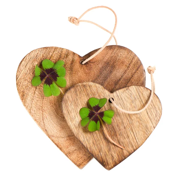 Wooden hearts with clover leaves — Stock Photo, Image