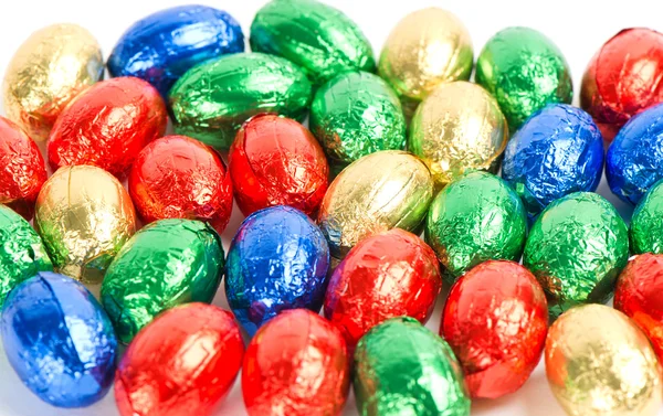 Chocolate easter eggs in colorful foil — Stock Photo, Image