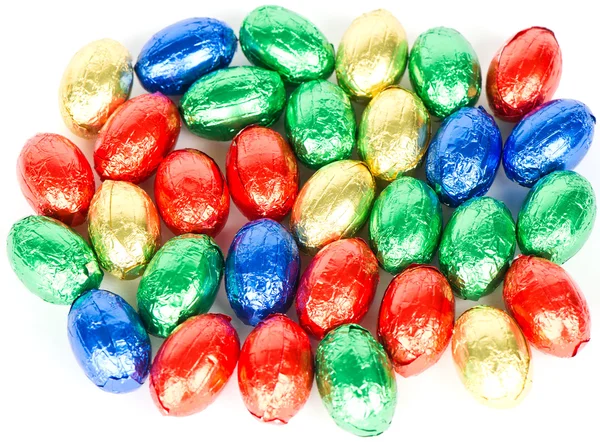 Chocolate easter eggs in colorful foil — Stock Photo, Image