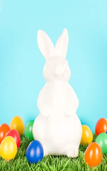 White bunny with colorful easter eggs. decoration — Stock Photo, Image