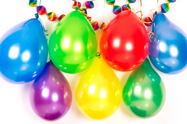 Kleurrijke ballonnen en slingers. Feestdecoratie — Stockfoto