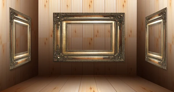 Wooden interior with golden frames — Stock Photo, Image