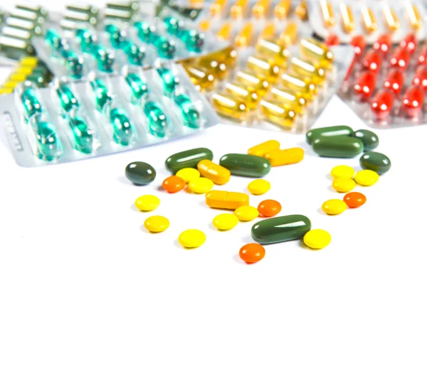 Assorted pills against white background. Assorted pills — Stock Photo, Image