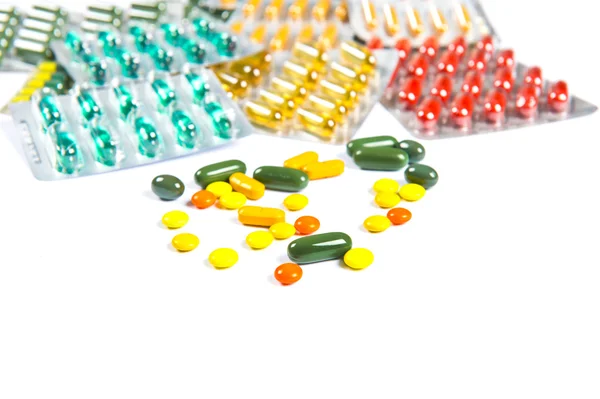 Assorted pills against white background. Assorted pills — Stock Photo, Image