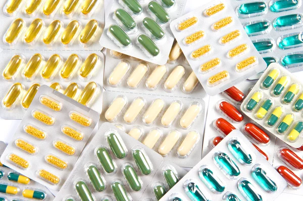 Colorful assorted pills and capsules — Stock Photo, Image