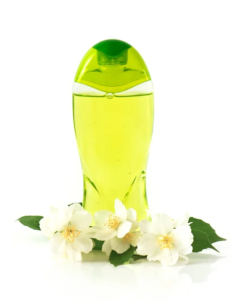Flaska flytande tvål med Jasmin blommor — Stockfoto