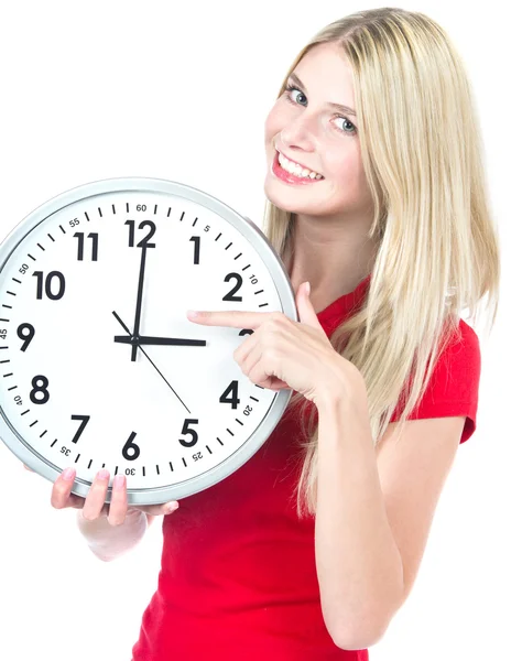 Young woman holding a clock. time management concept Royalty Free Stock Photos