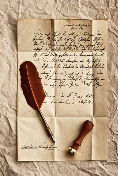 Old letter with vintage feather quill