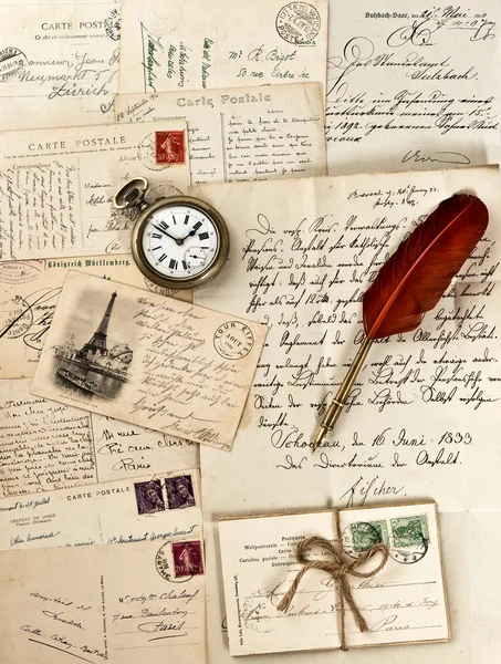 Letters and post cards with vintage clock — Stock Photo, Image