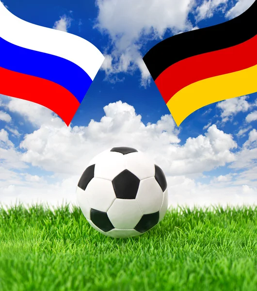 Voetbal veld en National vlaggen van Duitsland en Rusland — Stockfoto