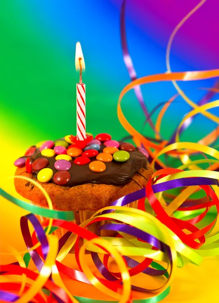 Birthday cupcake with burning candle — Stock Photo, Image