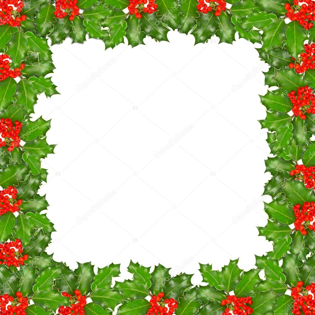 Frame of holly twigs with red berries