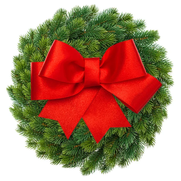 Groene de kroon van Kerstmis met red ribbon bow — Stockfoto