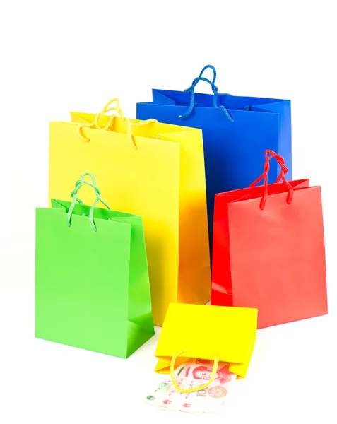 Sacos de compras vermelho, azul, amarelo, verde — Fotografia de Stock