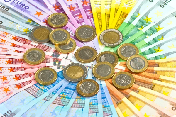 Monedas y billetes en euros. dinero fondo —  Fotos de Stock