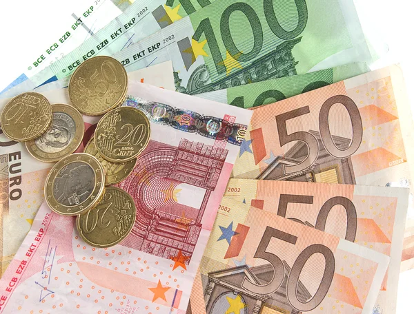 Gotówką euro. monety i banknoty na białym tle — Zdjęcie stockowe