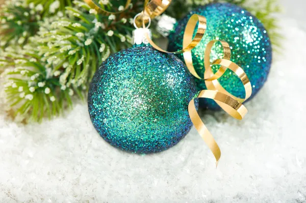 Christmas baubles with christmas tree branch — Stock Photo, Image