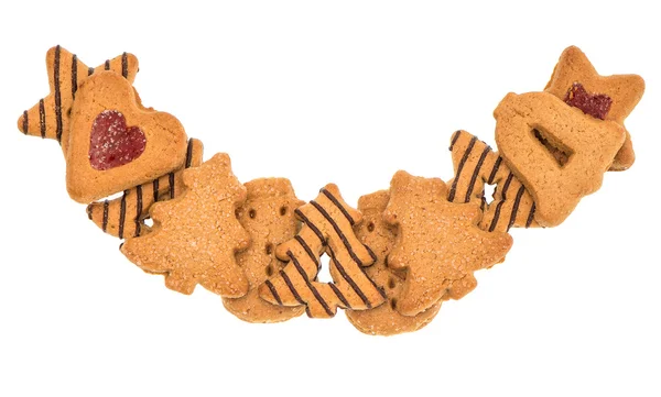 Garland from christmas cookies on white — Stock Photo, Image
